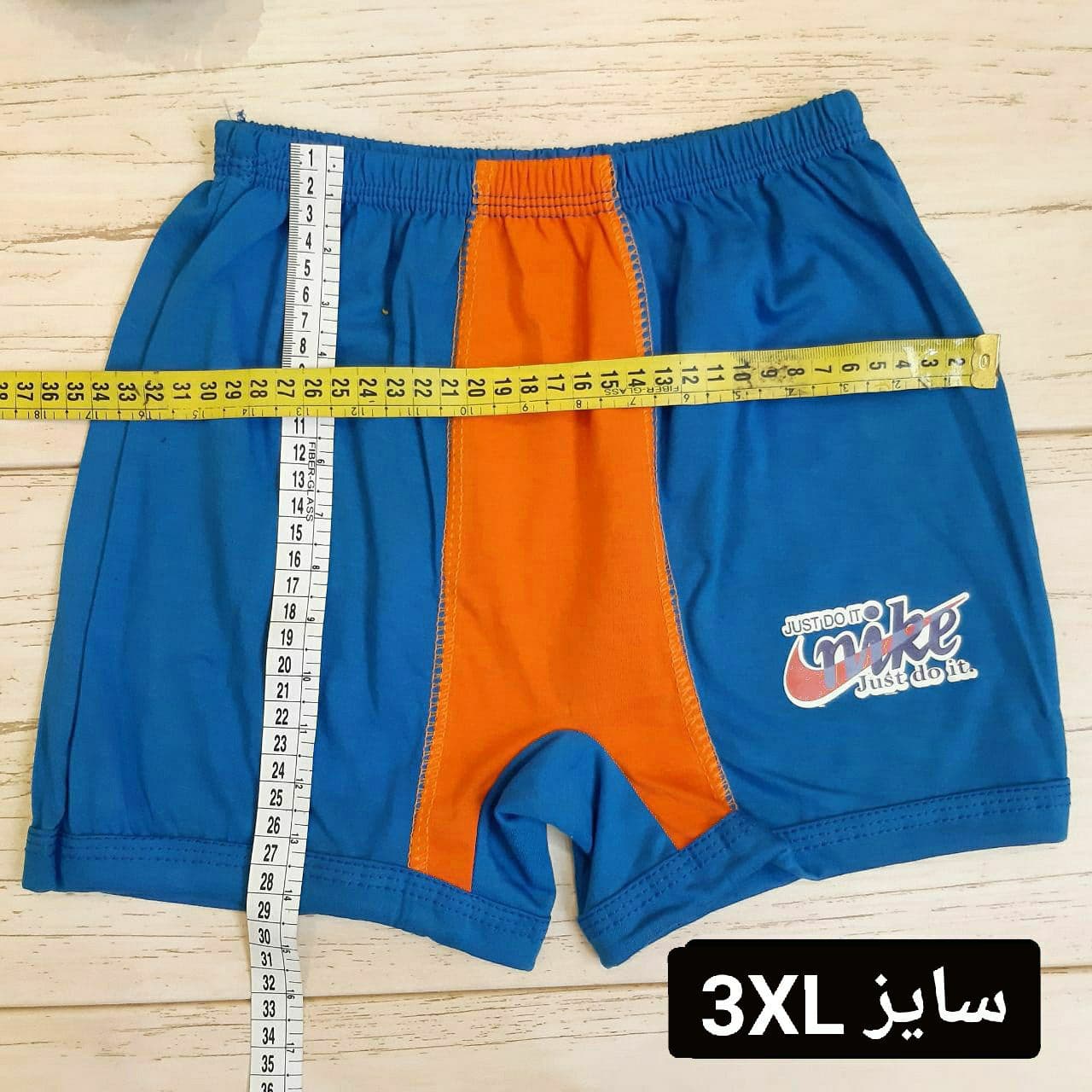 عکس شورت پسر پادار دورنگ - شماره 4